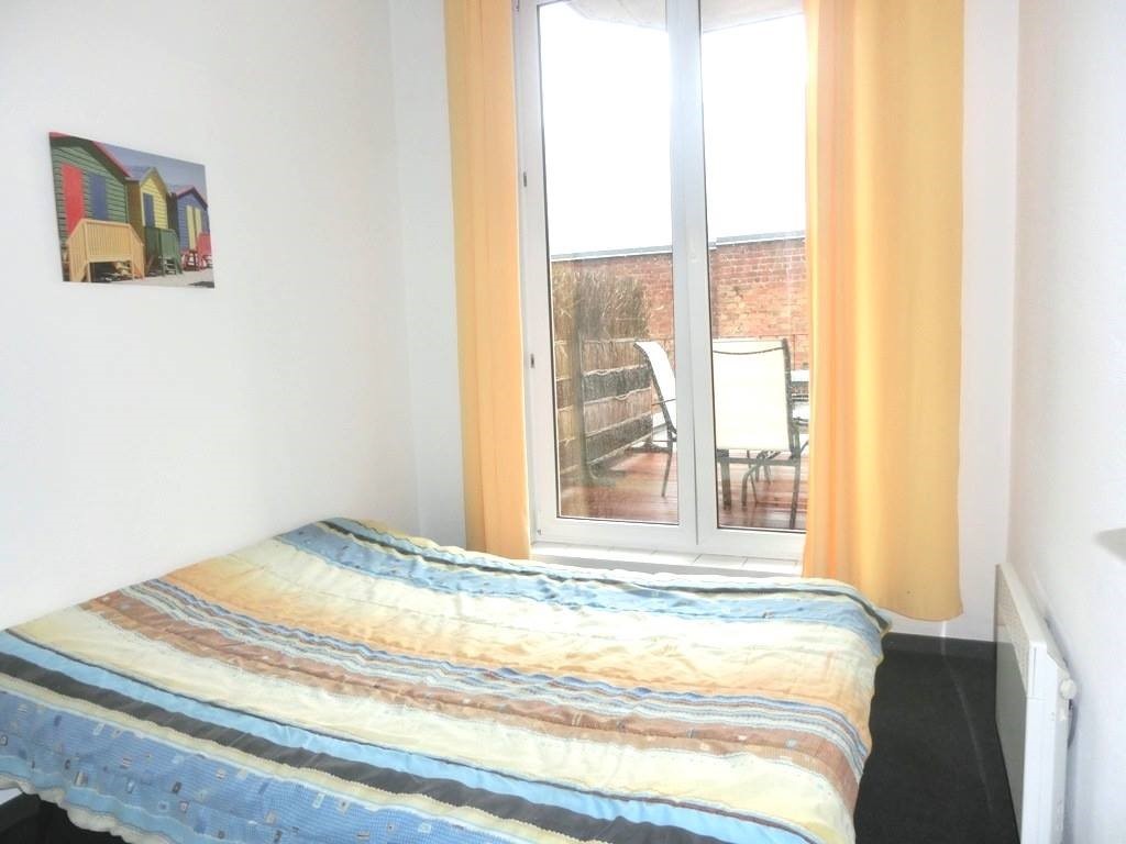 La première chambre de l'appartement Sloepen 1, à La Panne